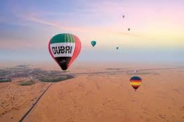 Hot air balloon flying over Dubai desert